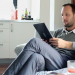 man holding tab
